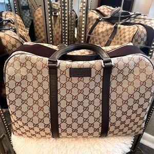 Gucci luggage like new